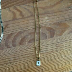 Gold twisted chain J necklace